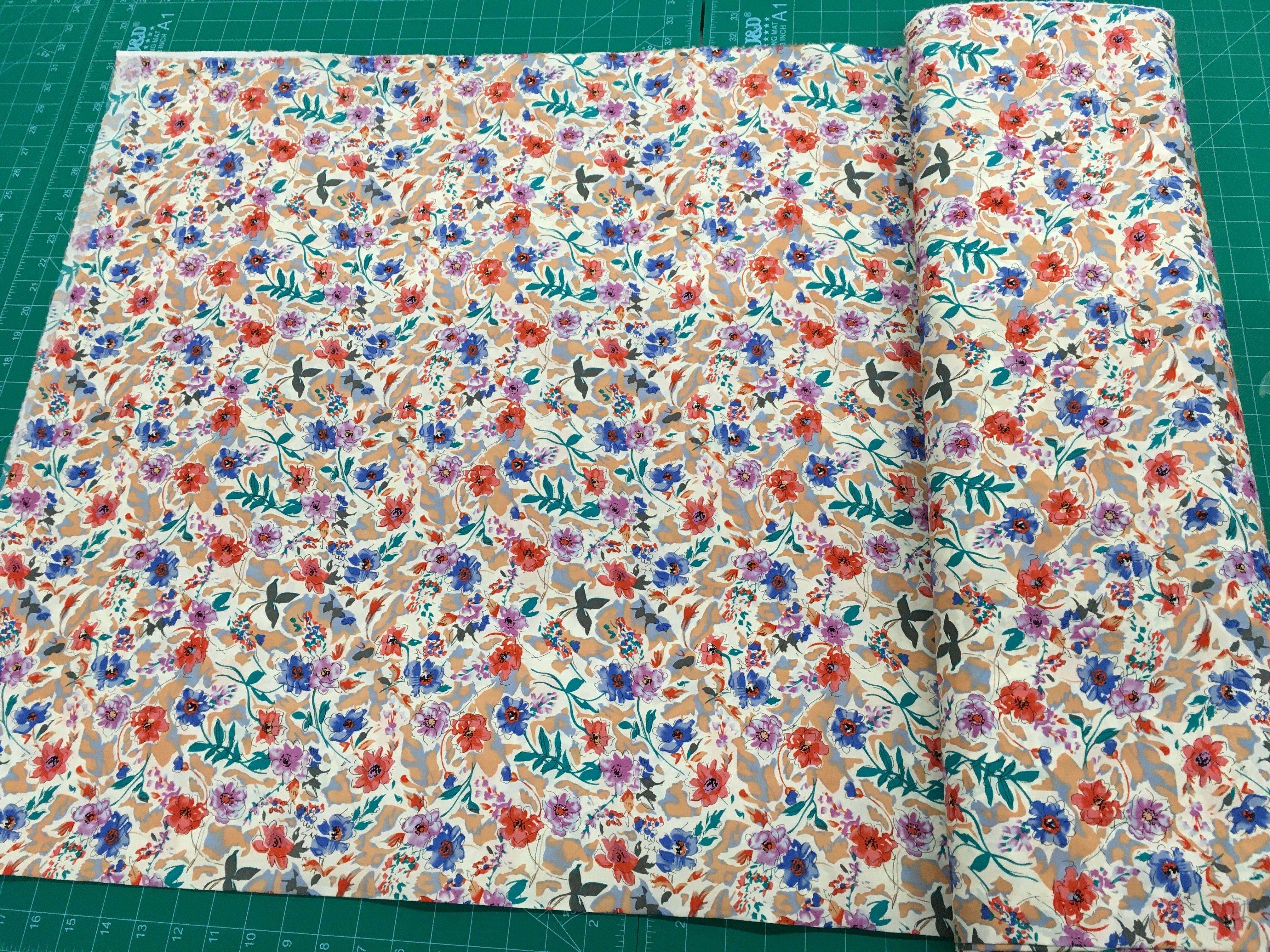 Blue Purple Orange Floral Tan Background 56 inch Cotton Fabric